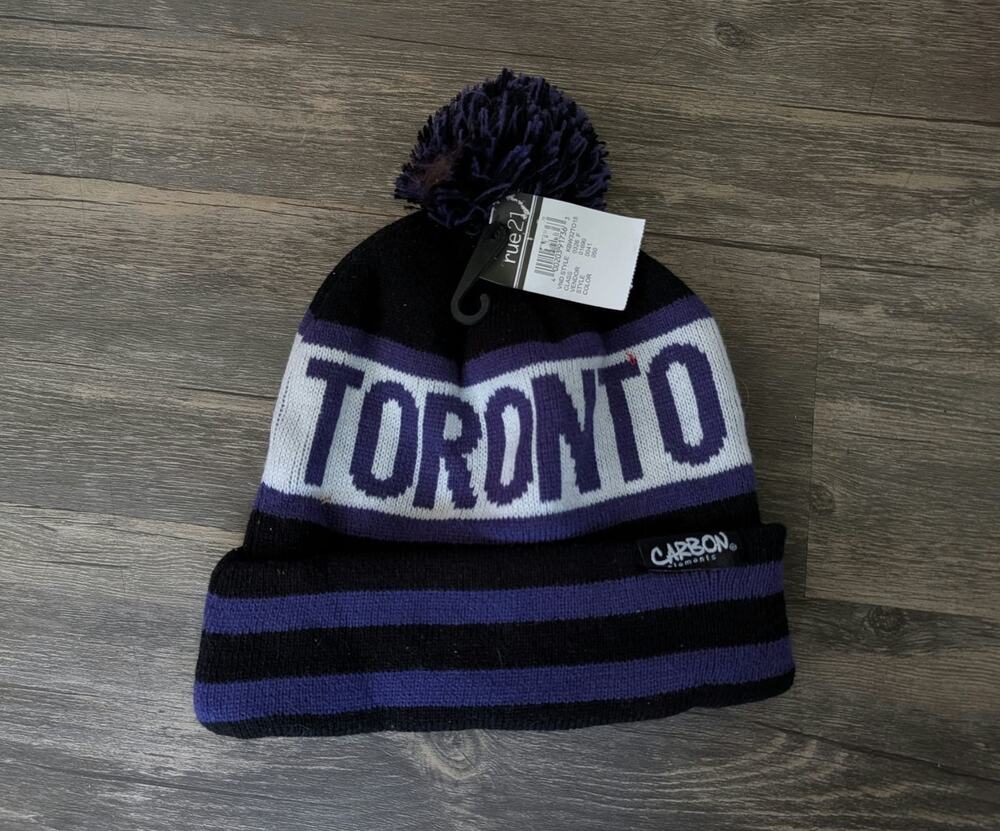 Carbon NBA Toronto Raptors Hardwood Classics Calgary Knit Hat Purple Black